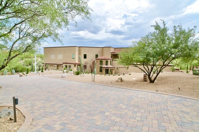 Building Photo - Mountain and City Views from this Furnishe...