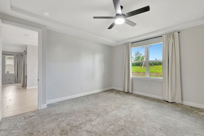 Building Photo - Spacious 4BR Home in Port St. Lucie – Modern Comfort Awaits