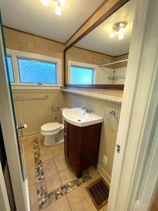 Building Photo - Spacious 3-Bedroom Near U-M Athletic Campus with Parking + Yard