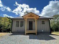 Building Photo - Cabin Life. Modern Comfort. Mountain Escape.