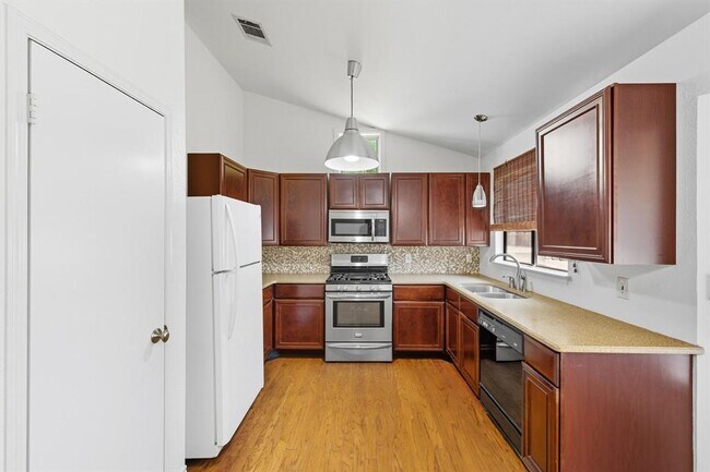 Building Photo - 8909 Romayne Ln