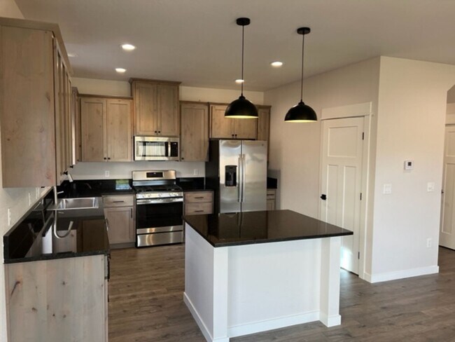 Building Photo - ALMOST NEW CONSTRUCTION/ 4 BEDROOM IN NEWER UPCOMING NEIGHBORHOOD