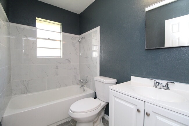 Building Photo - Updated 2BR/1BA Milton Triplex Unit Near Hwy 90 with Tile Flooring, Modern Bath Updates & Voucher...