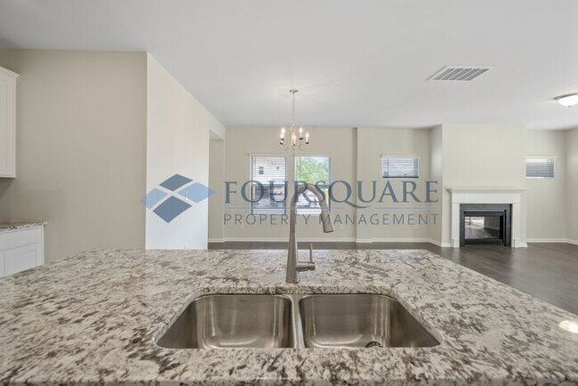 Building Photo - End-Unit Townhome with Loft, Open Floor Plan & Patio, Conveniently Located Near Dining, Shopping,...