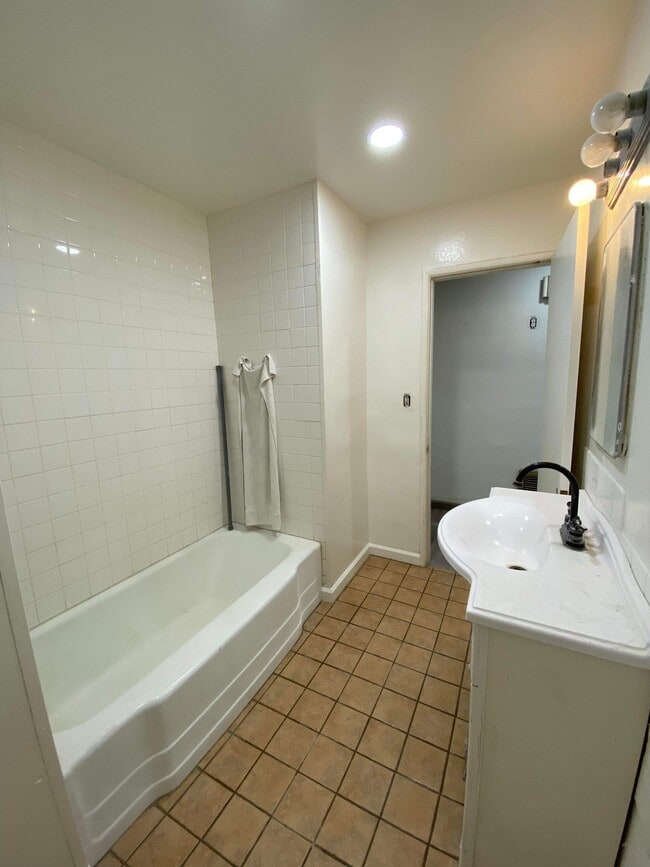 bathroom sink and tub - 33634 Colorado St