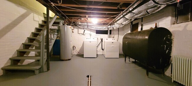 Building Photo - Remodeled brick bungalow with 1st floor li...