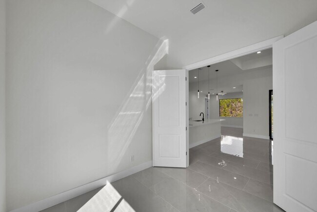 Building Photo - Single family for rent in Port Charlotte. New construction. 3+Den/ 2 bath. City water.