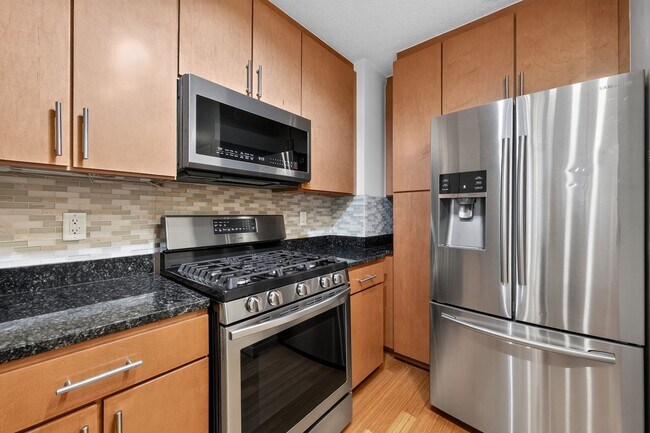 Building Photo - Penn Quarter 1BR Condo with Balcony, Garage Parking, Storage, Concierge, and Rooftop Deck.