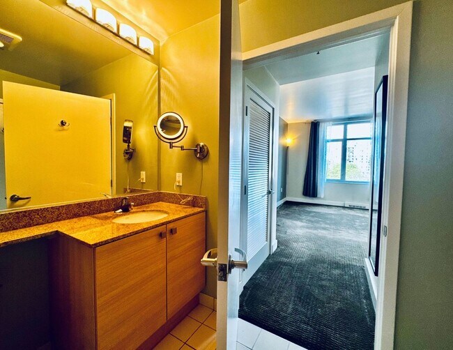 Building Photo - Corner Light. City Energy. Zero Compromise.