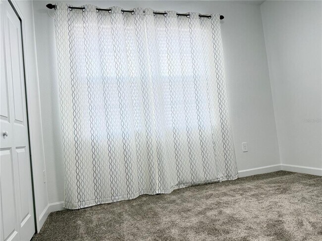 Building Photo - 7117 Dilly Lake Ave