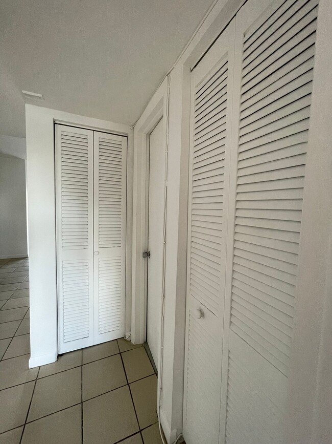 Hallway & Linen closet - 2060 NW 81st Ave