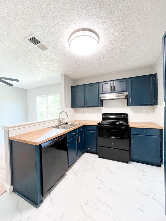 Building Photo - Available NOW!!!! This charming 2 story, 4...