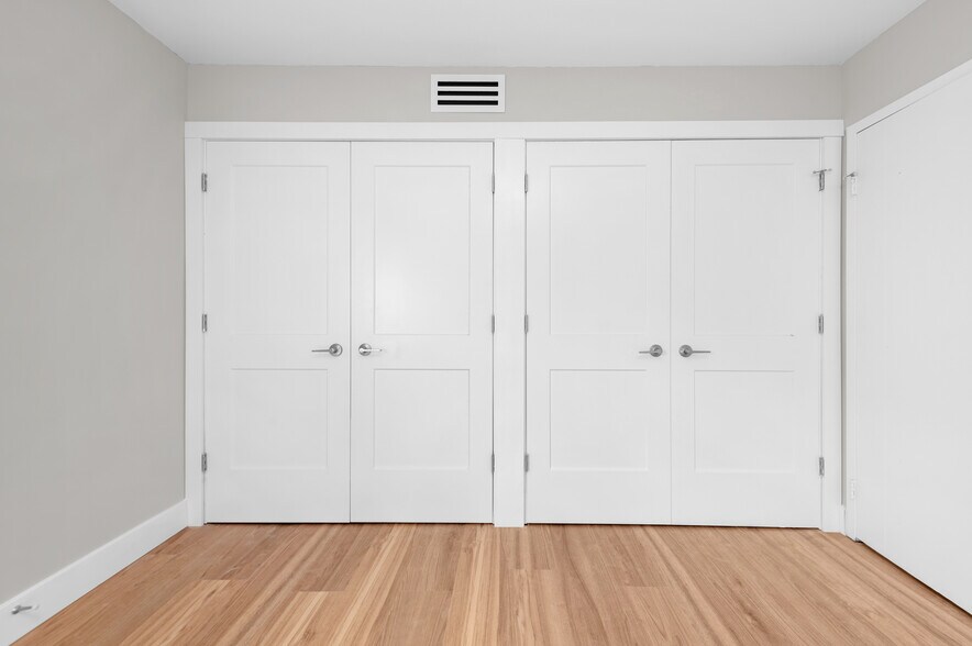 Bedroom Closet with Built In Cabinets - 20333 Detroit Rd