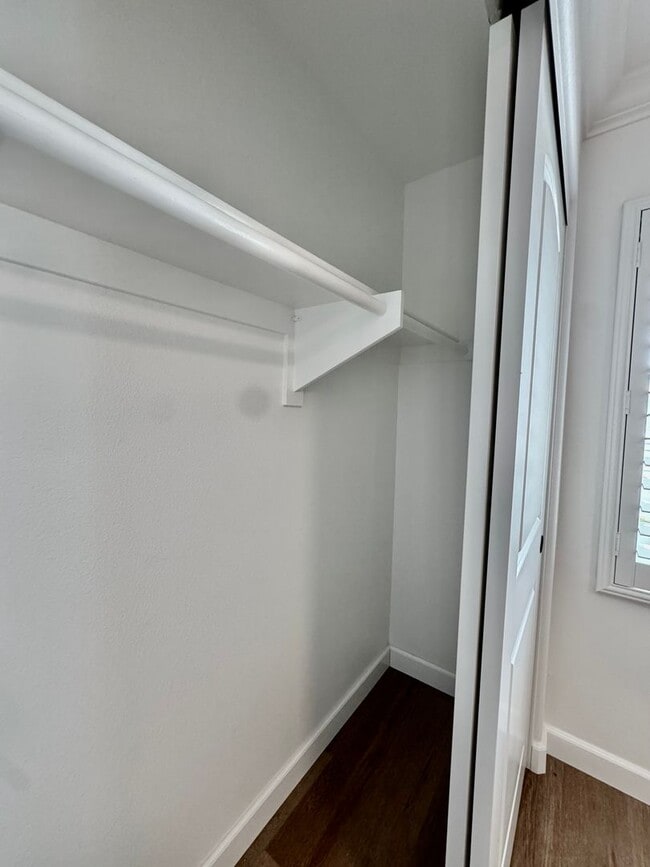 Building Photo - Beautifully Remodel Townhouse with AC & Two Car Garage!