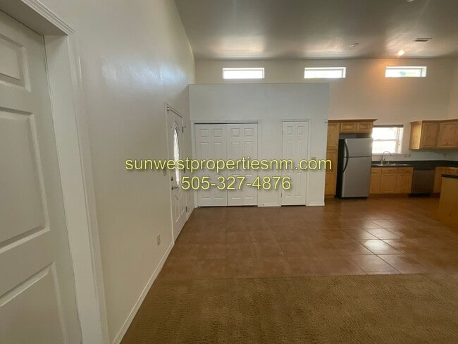 Building Photo - 3 Bedroom, 2 Bathroom Condo with 2 Car Gar...