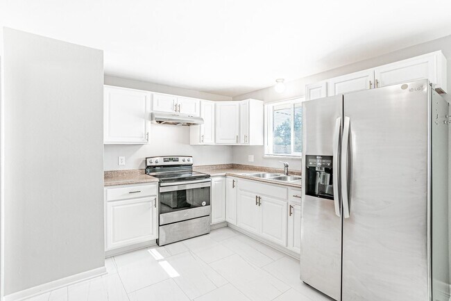 Building Photo - Charming 3BD, 2BA Arvada Home with 2-Car Garage and Yard