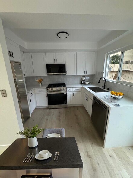 Building Photo - 8402 Larson Ave