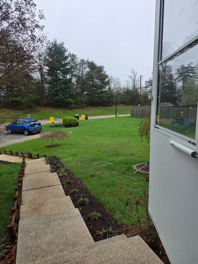 Building Photo - Serene Living in a Quiet Lakeside Community