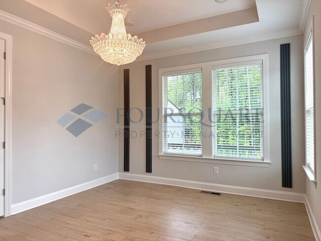 Building Photo - Elegant 4-Bed / 3.5-Bath Home with Main-Level Primary Suite, Quartz Kitchen & 3-Car Garage – In H...
