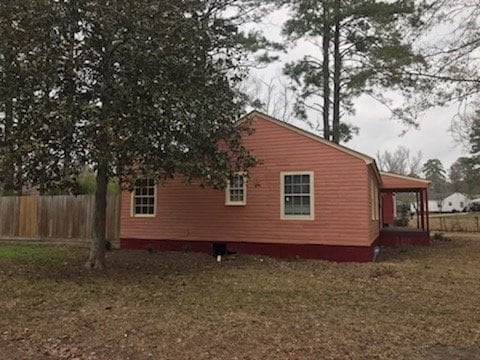 Building Photo - 3 Bedroom/1 bath home on corner lot with a large fenced back yard