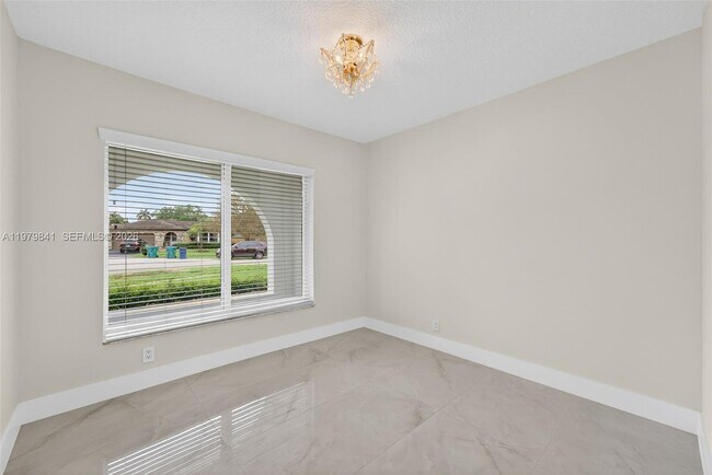 Building Photo - 8695 SW 51st Pl