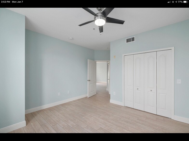 Master bedroom with ceiling fan - 11041 Legacy Blvd