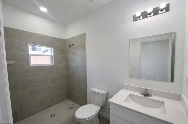 Building Photo - Brand new 2/1 -LARGE BACK YARD- LEHIGH ACRES