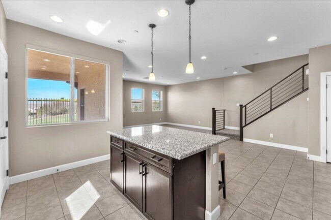 Building Photo - 4-Bedroom Tuscany Townhome with Strip & Golf Course Views