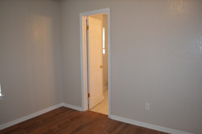 Building Photo - This 3 Bedroom Home with Fireplace is a must see!