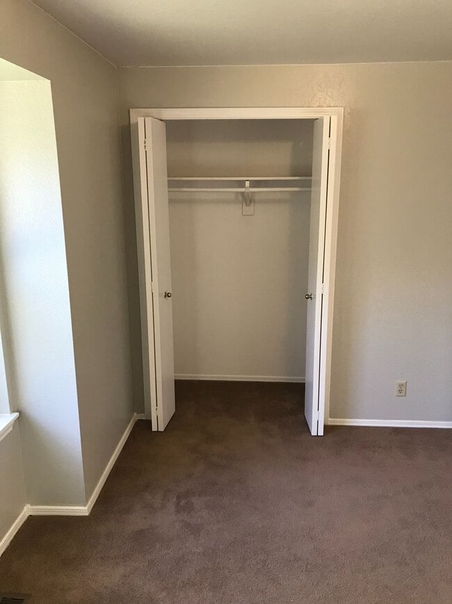 Building Photo - Coming in March – Beautiful Single-Story Home with Dual Living Spaces & Fenced Yard