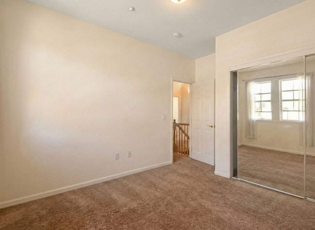 Building Photo - Spacious 3-Bedroom Dublin Townhome with Private Balcony & Fireplace
