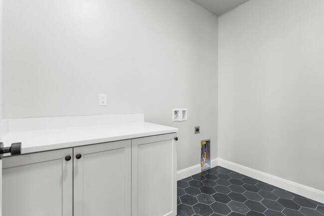 Building Photo - Modern New Construction with Designer Finishes & Open-Concept Living