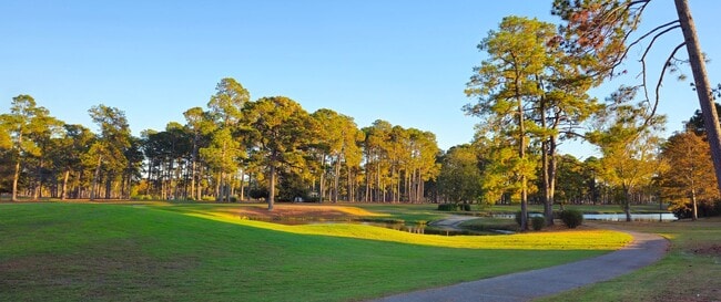 Building Photo - Live the Dream: Luxury Golf Course Living Awaits!
