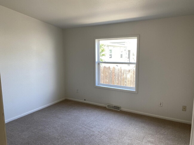 Building Photo - Available Now! "Spacious 3-Bedroom Retreat...