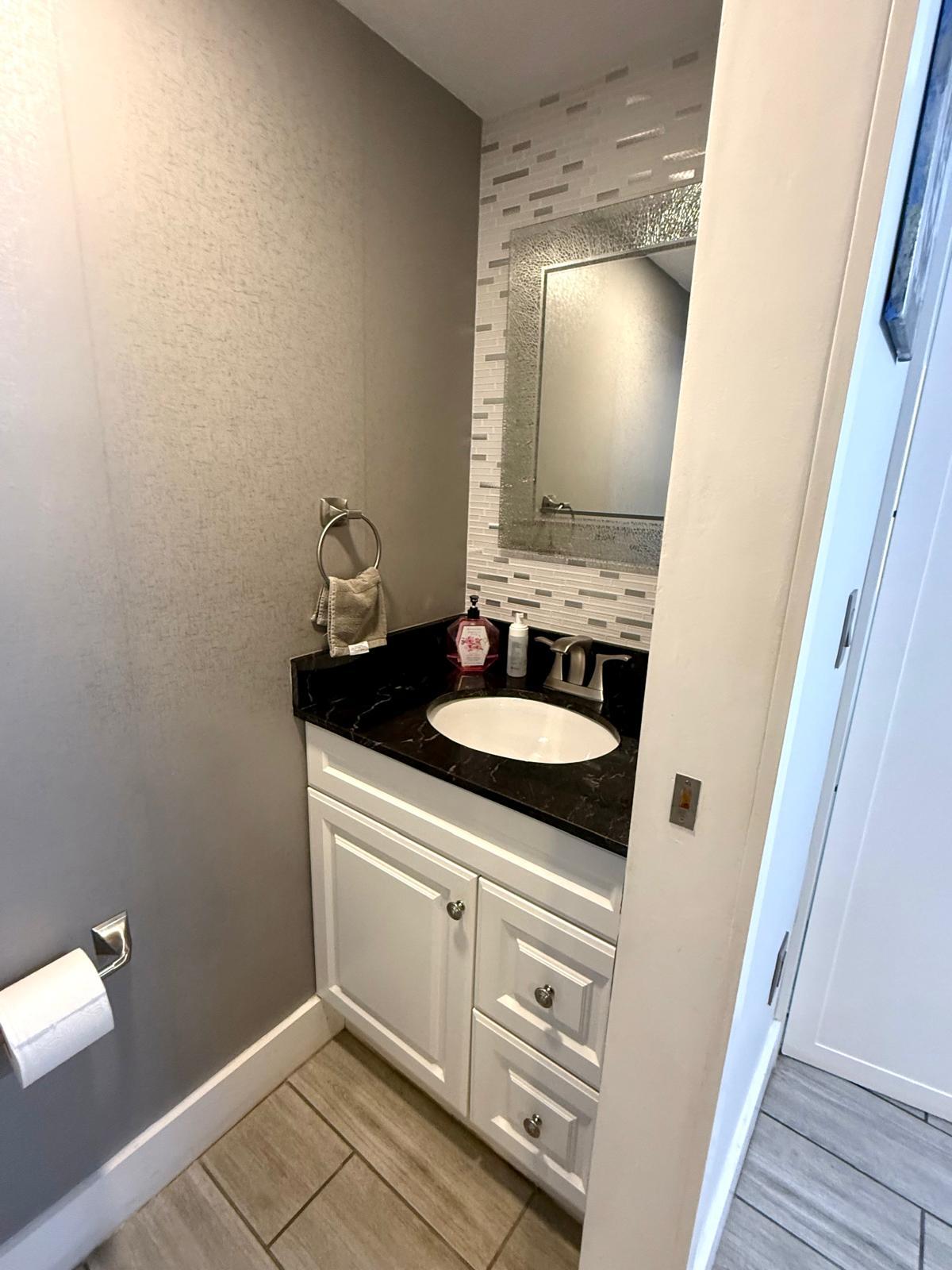 Half bath Vanity - 828 W 38th Ter
