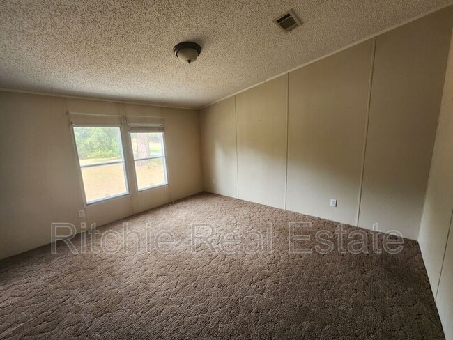 Building Photo - 6912 Esler Field Rd