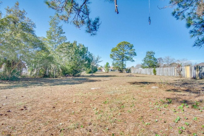 Building Photo - Lakefront 3BR/2BA Home on Orion Lake with Florida Room, Screened Patio, Hot Tub (As-Is), Solar Pa...