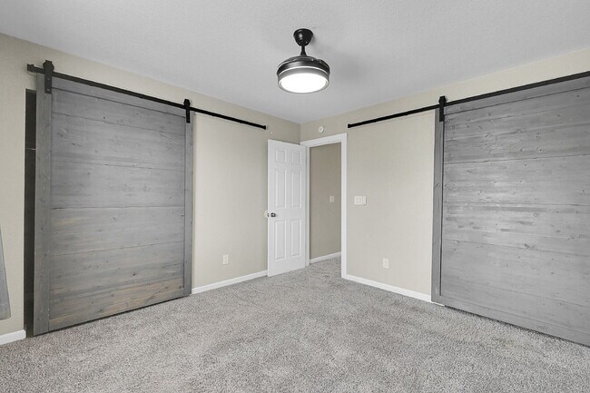 Building Photo - $1,495, 2-bed, 1.5 bath Unit in CO Springs with Assigned Parking Spot.