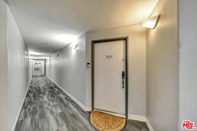 Building Photo - 4477 Woodman Ave