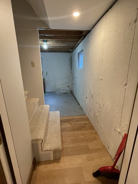 Door to basement and access to shared laundry. - 569 Belle Vista Rd