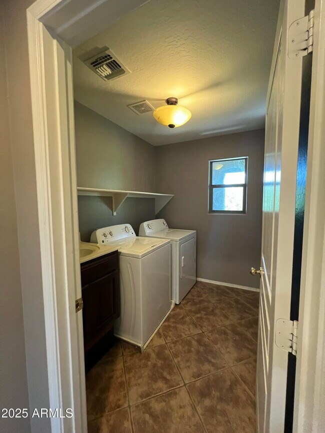 Building Photo - 14711 W Riviera Dr