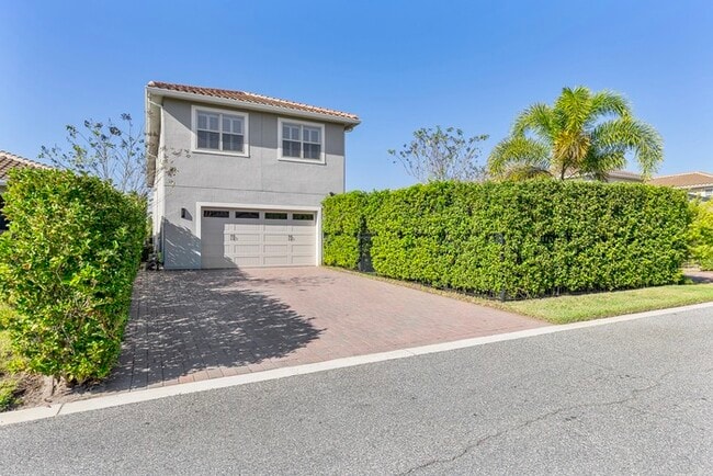Building Photo - Luxury 5-Bedroom Residence in Eagle Creek with Indoor-Outdoor Living