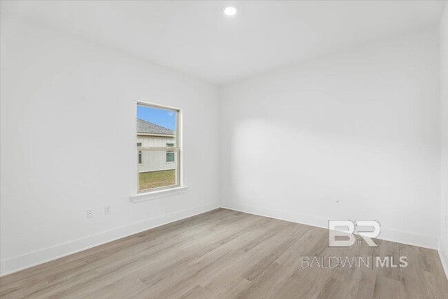 Building Photo - 10452 Winning Colors Trl