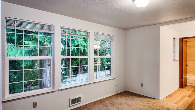 Building Photo - Bright 3-Bed Bothell Home with Attached Garage, Cozy Fireplace, and Private Garden Oasis