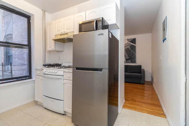 Building Photo - 309-311-311 E 95th St