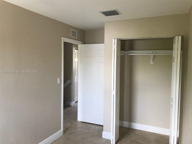 Building Photo - 1990 NW 4th Ct