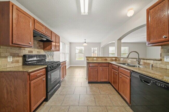 Building Photo - Spacious 4-Bedroom Home in Winfield Lakes