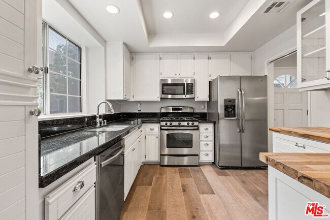Building Photo - 8505 Gulana Ave