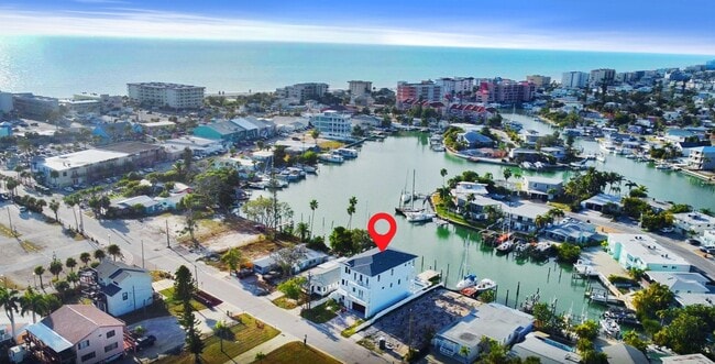 Building Photo - Waterfront Johns Pass Luxury | Steps to Beach + Pool, Hot Tub & Dock