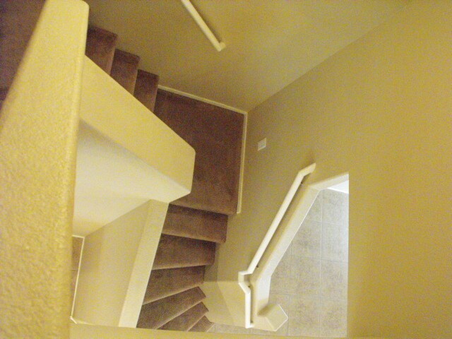 Building Photo - Spacious Henderson townhouse featuring   3 bedrooms PLUS 2 car garage.